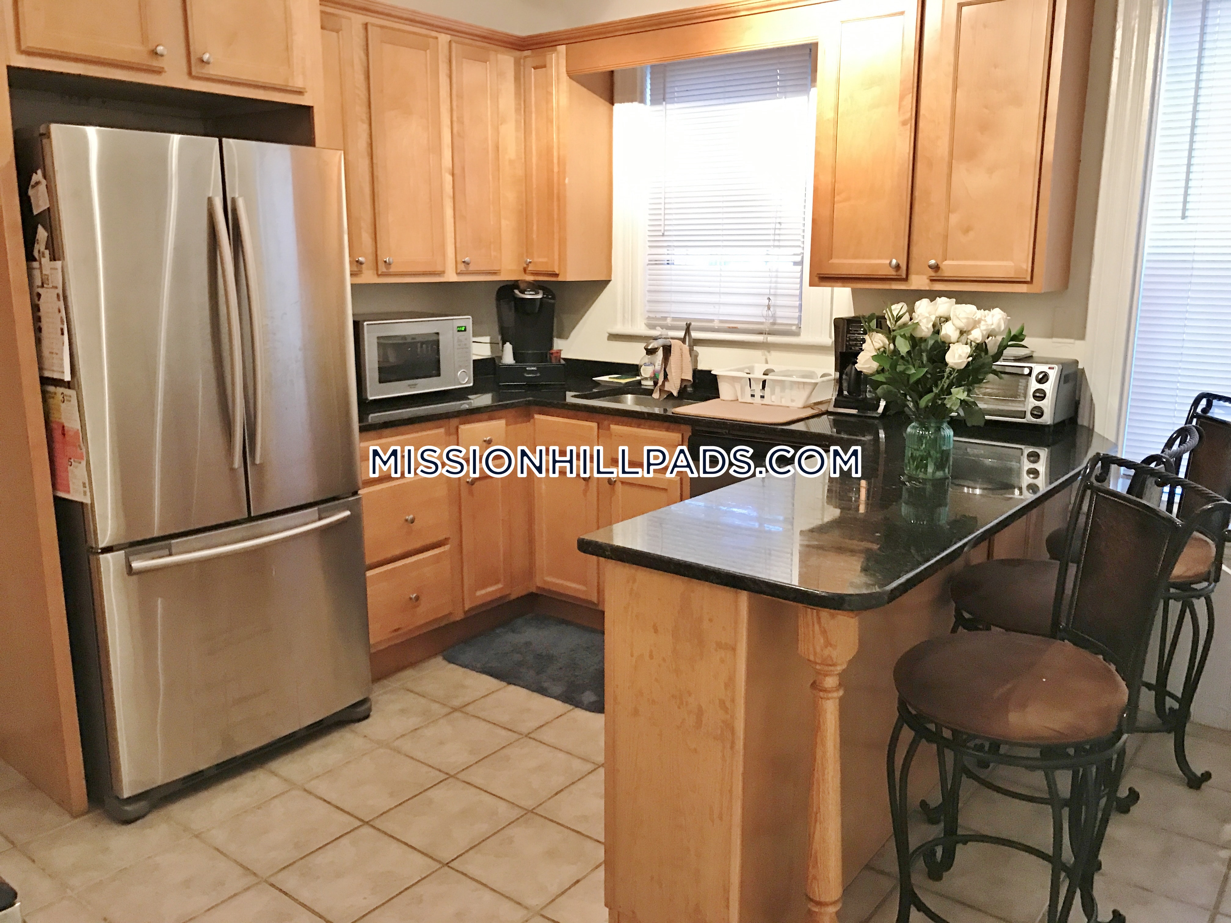 4 bed, 1 bath apartment for rent at 12 Oswald St Unit 2A, Mission Hill — photo 1 of 5