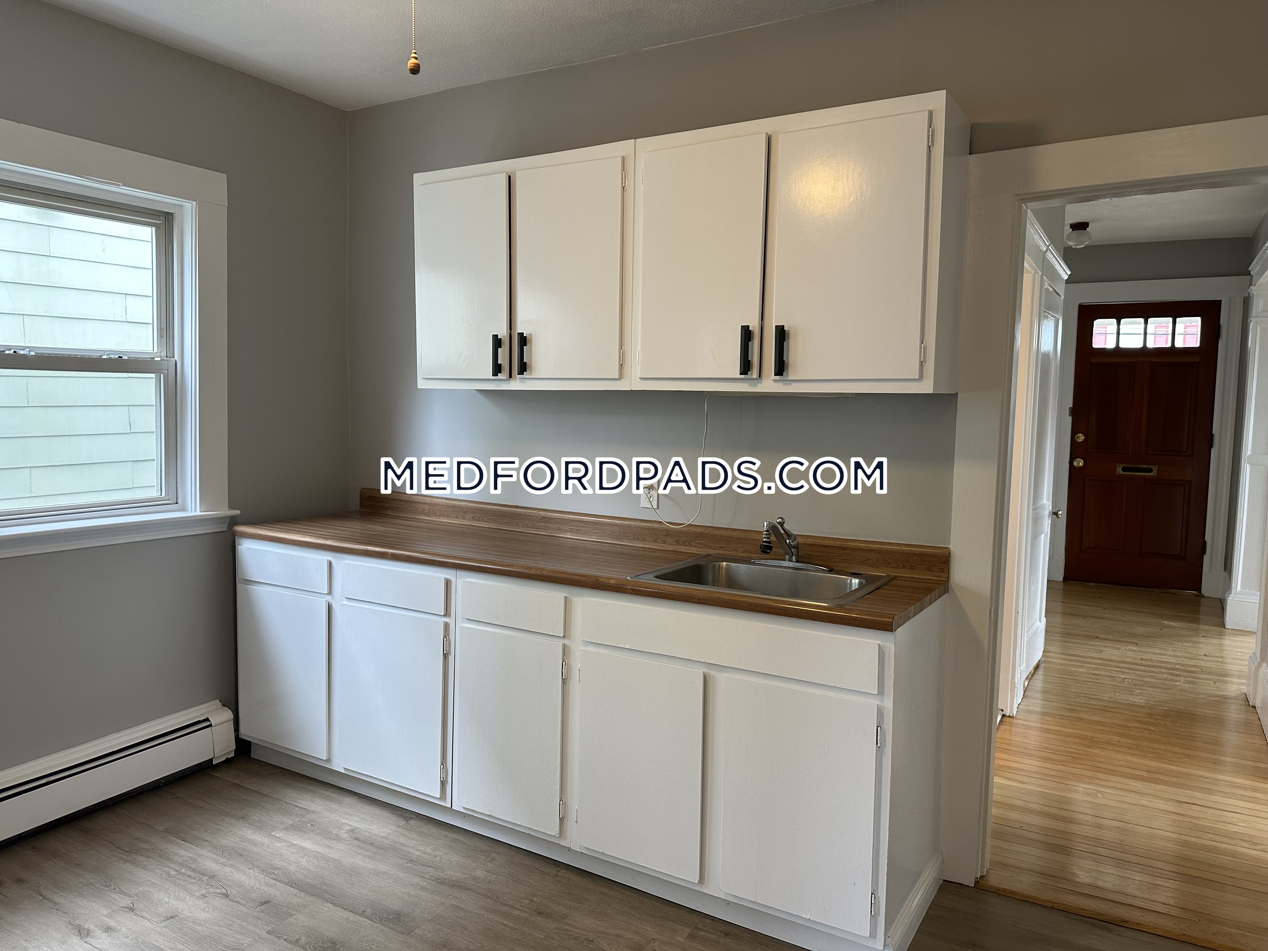 2 bed, 1 bath apartment for rent at 49 Pearl St Unit 1, Medford — photo 1 of 11