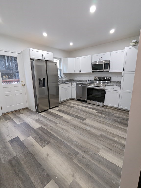 4 bed, 3 bath apartment for rent at 207 Athens St Unit 1, South Boston — photo 1 of 18