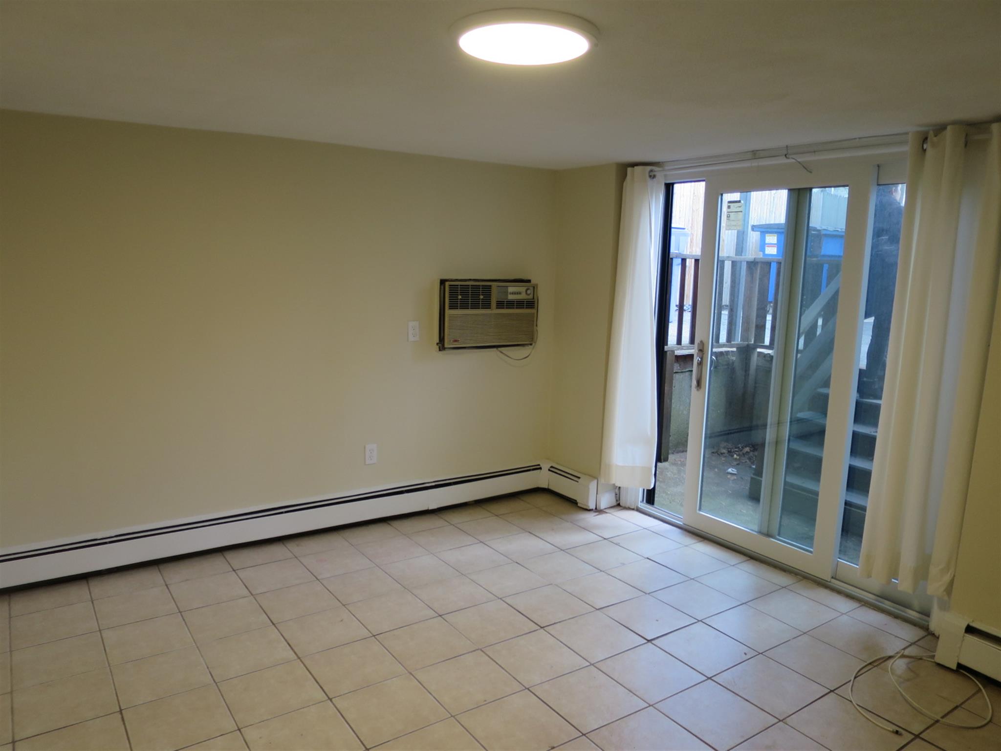 2 bed, 1.5 bath apartment for rent at 23 Suffolk St Unit A, Central Square — photo 2 of 8
