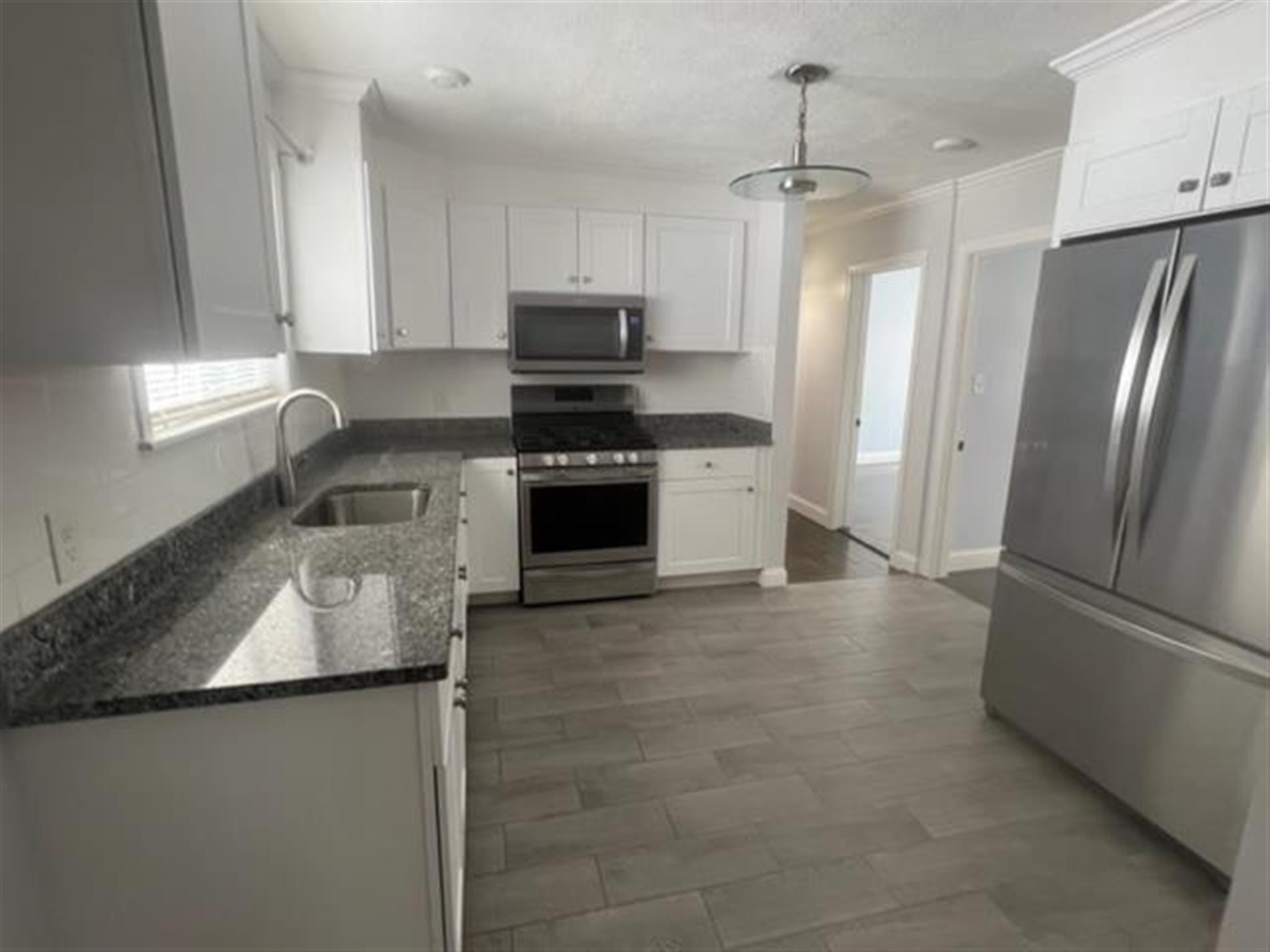3 bed, 1 bath apartment for rent at 22 Gordon St Unit 1, Teele Square — photo 1 of 12