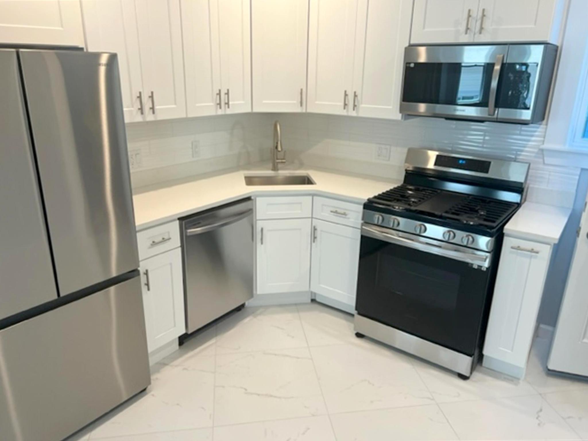 4 bed, 2 bath apartment for rent at 31-33 Raymond Ave Unit 1, Teele Square — photo 1 of 17