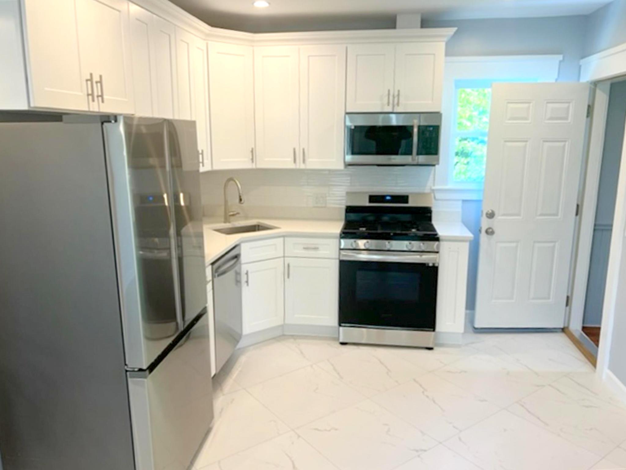 4 bed, 2 bath apartment for rent at 31-33 Raymond Ave Unit 1, Teele Square — photo 2 of 17