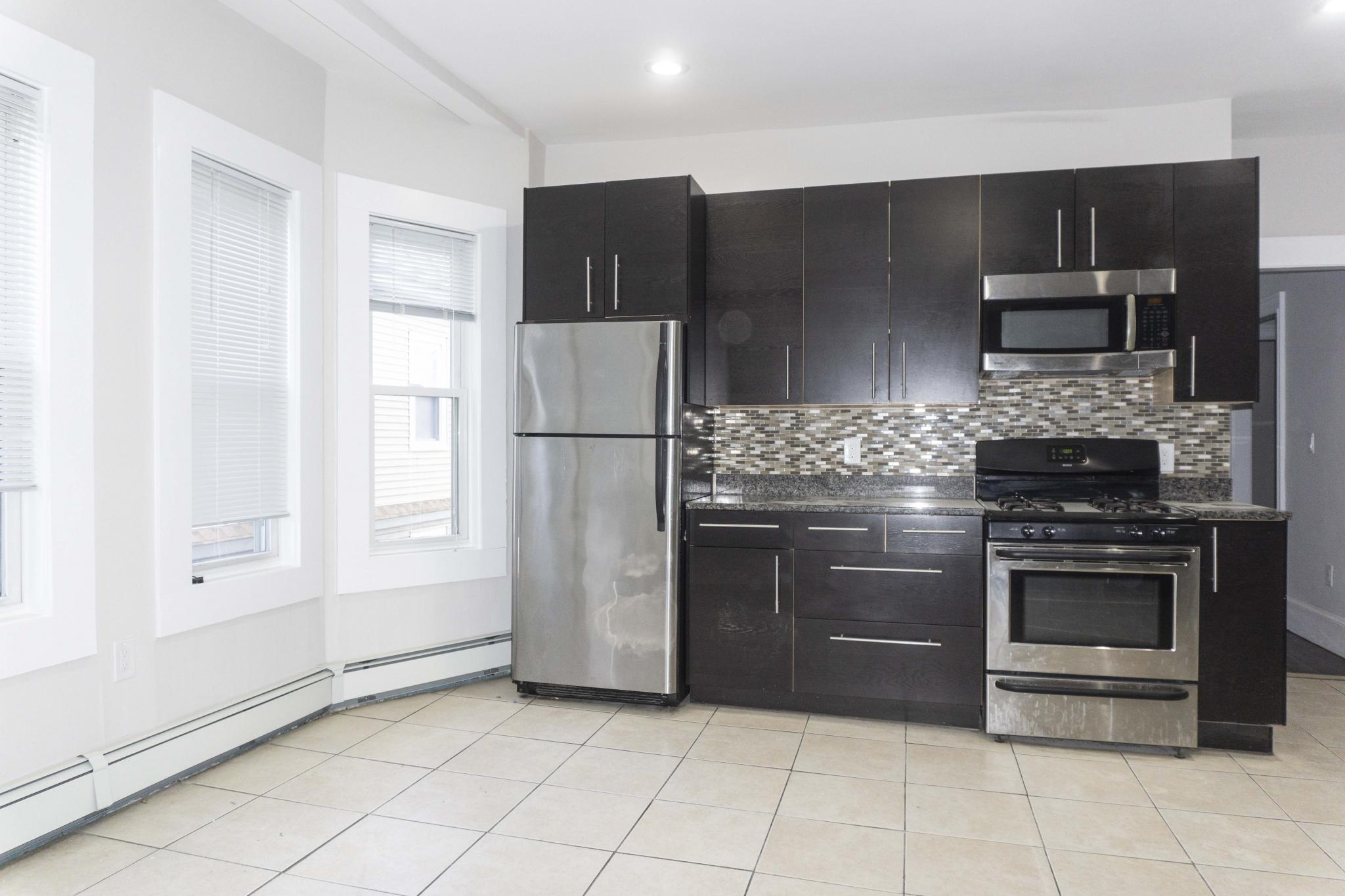 3 bed, 1 bath apartment for rent at 3147-3149 Washington St Unit 3, Jamaica Plain — photo 1 of 8