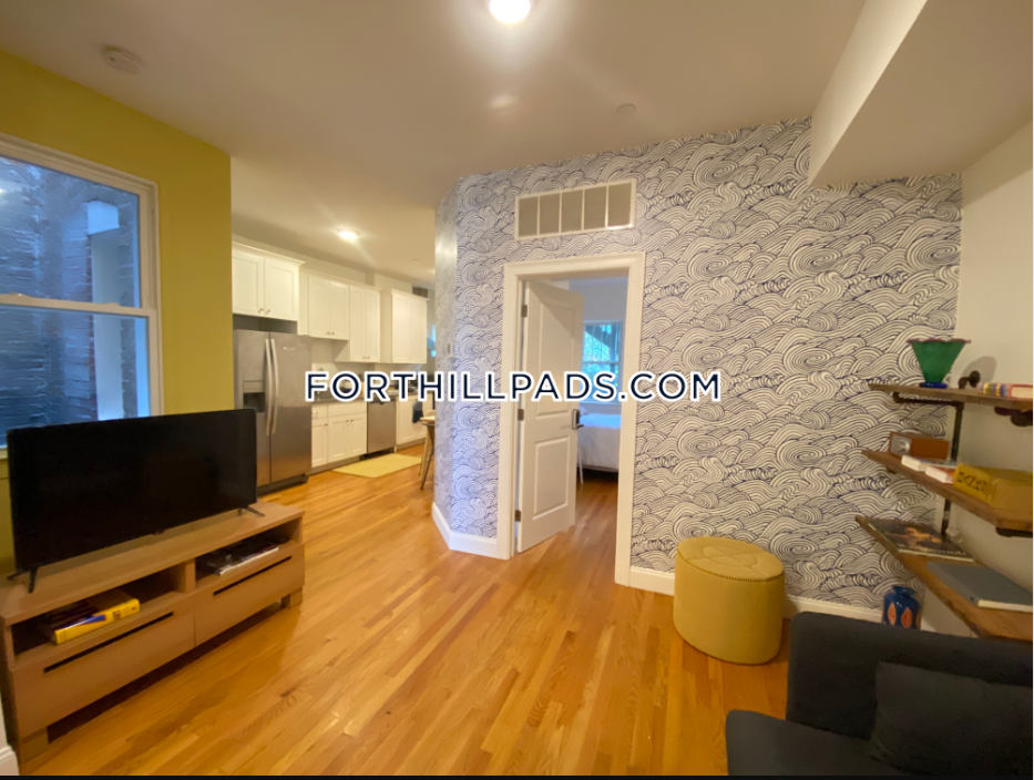 4 bed, 2 bath apartment for rent at 48 Guild St Unit 2, Roxbury — photo 2 of 10