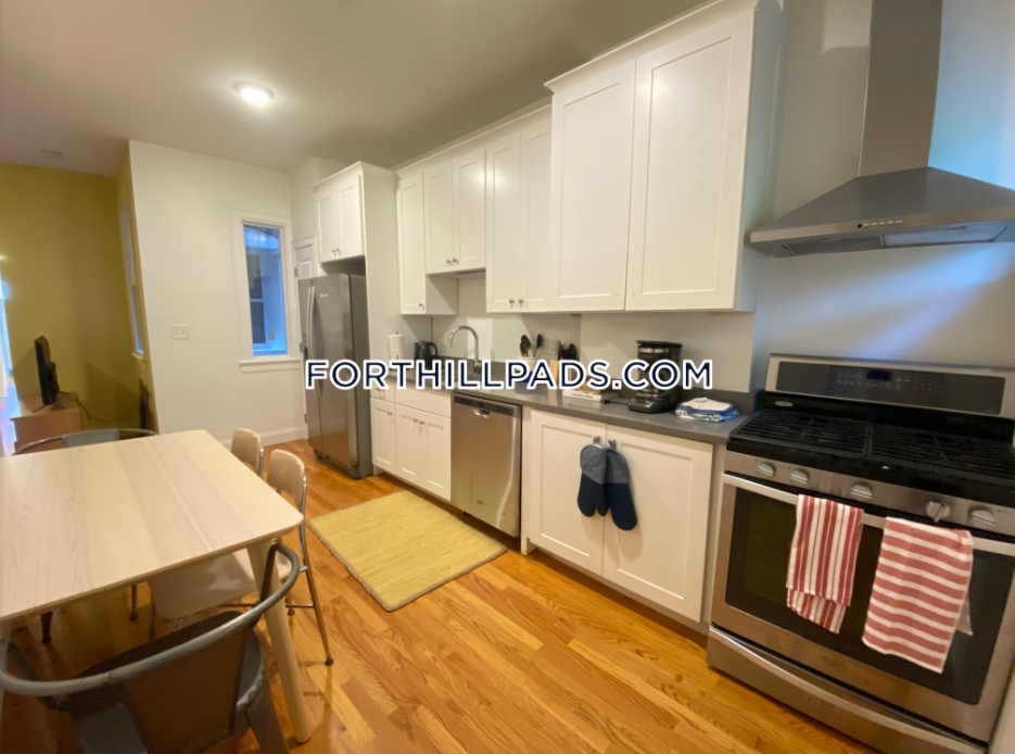 4 bed, 2 bath apartment for rent at 48 Guild St Unit 2, Roxbury — photo 1 of 10