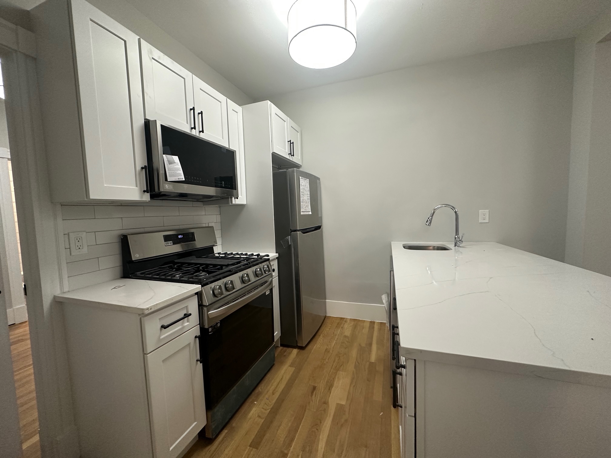 5 bed, 2 bath apartment for rent at 68 L Unit 1, South Boston — photo 2 of 9