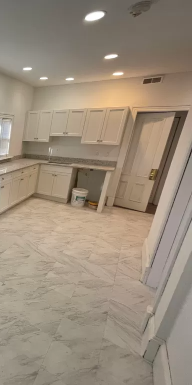 7 bed, 2 bath apartment for rent at 26 Woodville St Unit 2, Roxbury — photo 2 of 25