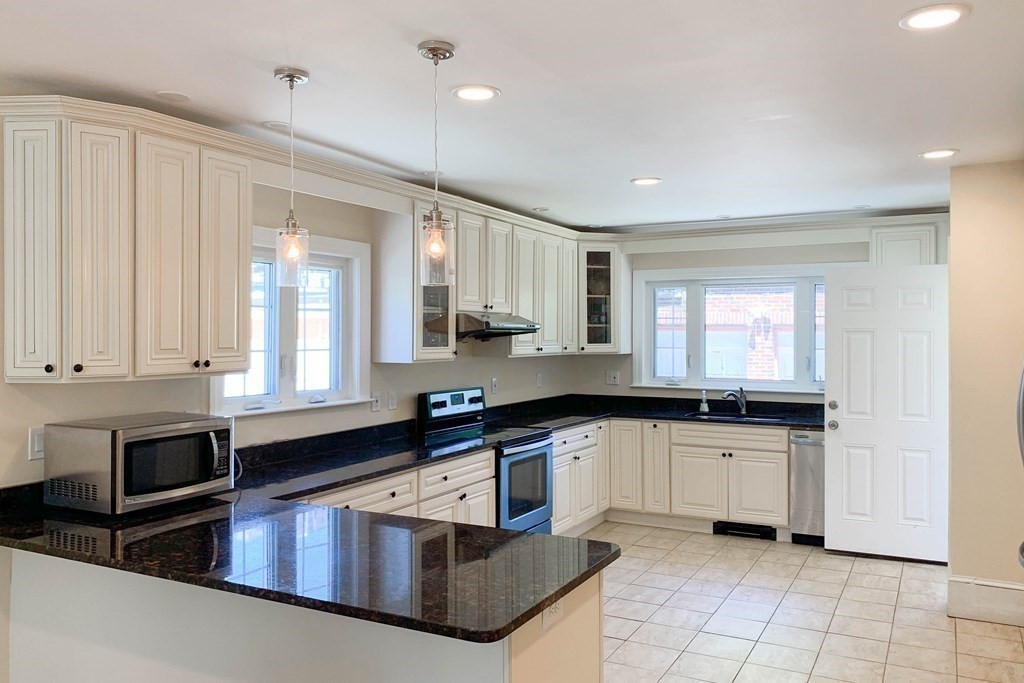 6 bed, 3.5 bath apartment for rent at 25 Adams St Unit 1, Coolidge Corner — photo 3 of 16